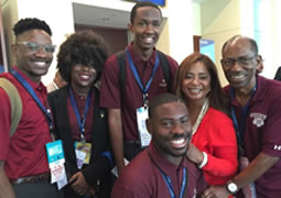 Morehouse College students went to Philadelphia to cover the Democratic National Convention. From left: Ugo Unigwe, DeShay Kidd (from Spelman College), Kingsley Iyawe, Donzaleigh Abernathy, adviser Ron Thomas. Ayron Lewallen is in foreground. Abernathy is the daughter of civil rights leader the Rev. Ralph David Abernathy. (Credit: Morehouse College)